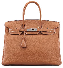 . Через некоторое время актрисе преподнесли сумку её мечты. На самом деле модель сумки, ставшая впоследствии культовой, уже много лет существовала в арсенале Hermes просто как дорожная сумка -Travel Bag. Немного изменив дизайн Travel Bag, и преподнеся её кинозвезде, компания Hermes создала мировой бестселлер. 